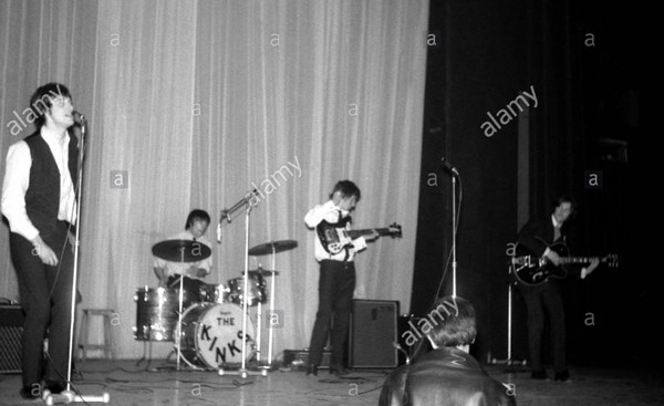 Pete Quaife of the Kinks, late 1964, with a small box vox ac50